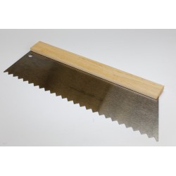 Spatule en acier bleui crantée